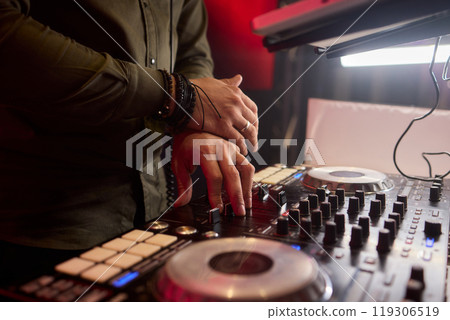 Audio Mixing Console in a Recording Studio with advanced sound production capabilities Audio Mixing Console in a Recording Studio with advanced sound production capabilities 119306519