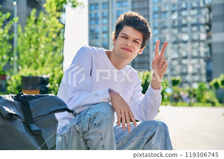 Outdoor, portrait smiling handsome young male 19-20 years old 119306745
