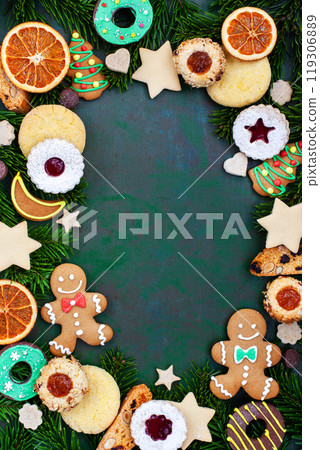 Frame of many different homemade sweet Christmas cookies, top view, copy space, holiday concept Frame of many different homemade sweet Christmas cookies, top view, copy space, holiday concept 119306889