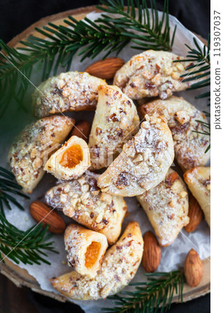 Homemade delicious almond and cottage cheese with apricot jam filling crescent cookies Homemade delicious almond and cottage cheese with apricot jam filling crescent cookies 119307037