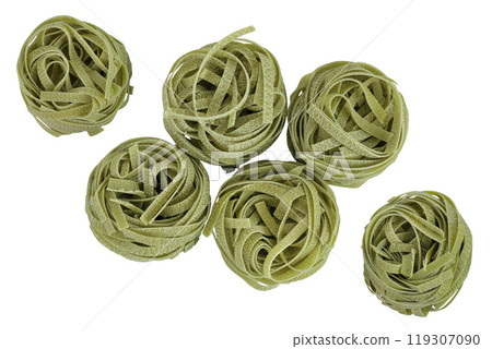 Raw tagliatelle green pasta with spinach isolated on white background. Top view. Flat lay 119307090