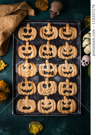 Halloween cookies in shape of jack-o-lantern Halloween cookies in shape of jack-o-lantern 119307276