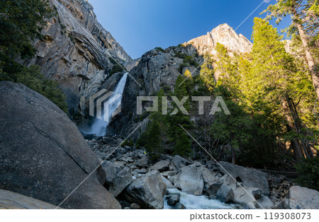 Sunny view of the Lower Yosemite Falls in Yosemite National Park 119308073