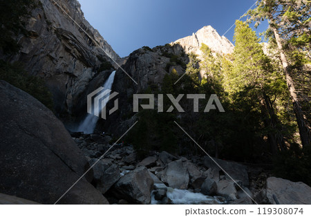 Sunny view of the Lower Yosemite Falls in Yosemite National Park 119308074