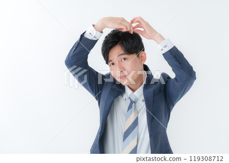 Businessman doing hair styling Businessman doing hair styling 119308712