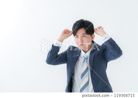 Businessman doing hair styling Businessman doing hair styling 119308715