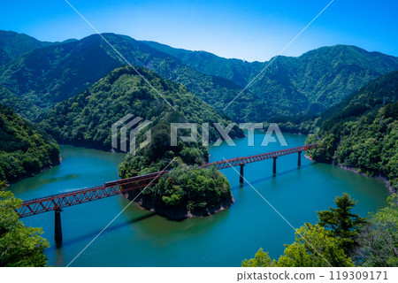 Oi Railway, Shizuoka Prefecture, trains parked at Okuoi Lakeside Station amid fresh greenery, a beautiful landscape popular with railway fans 119309171