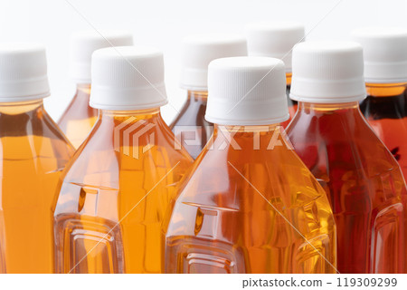 Close-up of plastic bottles of different kinds of tea Close-up of plastic bottles of different kinds of tea 119309299