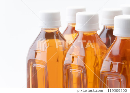 Close-up of plastic bottles of different kinds of tea Close-up of plastic bottles of different kinds of tea 119309300