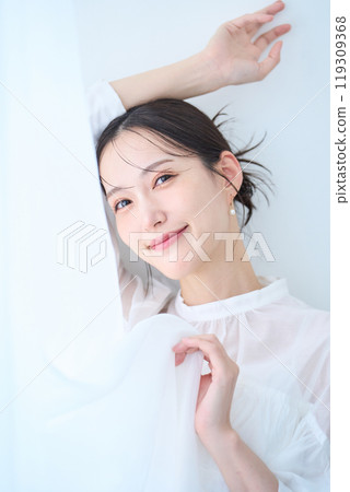 Woman in white image 119309368