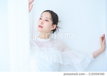Woman in white image 119309380