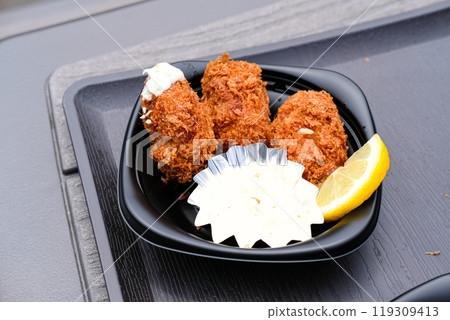Fried oysters and tartar sauce 119309413