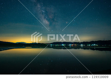 Scenery of the Milky Way in Ojiya City, Niigata Prefecture, rural landscape, reflection in the water of rice fields Scenery of the Milky Way in Ojiya City, Niigata Prefecture, rural landscape, reflection in the water of rice fields 119310009