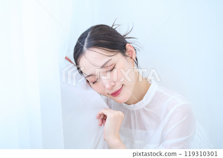 Woman in white image Woman in white image 119310301
