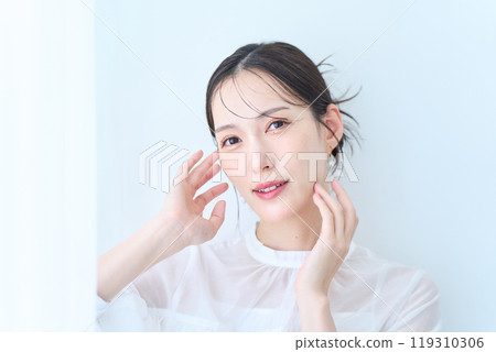 Woman in white image Woman in white image 119310306