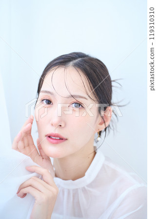 Woman in white image 119310310