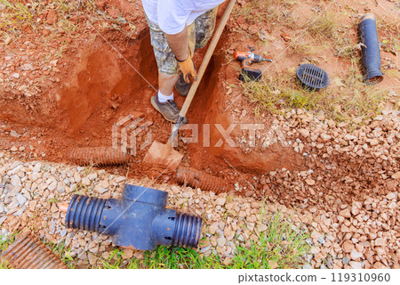 An underground storm sewer pipe needs to be replaced because it is damaged unable to collect rainwater. 119310960