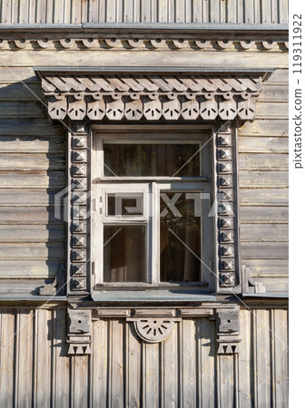 Wooden window in old wooden house Wooden window in old wooden house 119311922