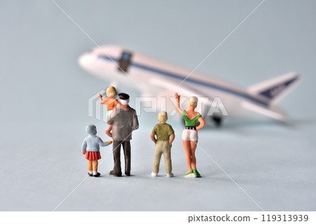 Image of a family waving goodbye to an airplane Image of a family waving goodbye to an airplane 119313939