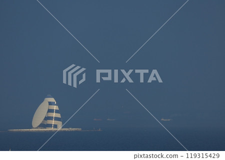 View of the Tokyo Bay Aqua-Line road and the Tower of Winds (Kawasaki artificial island) in Tokyo Bay from Kawasaki 119315429