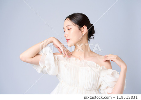 Young woman with a gentle expression Young woman with a gentle expression 119315831