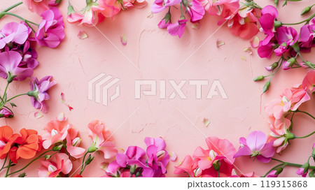 淡粉色背景上盛開的彩色花朵框架 119315868