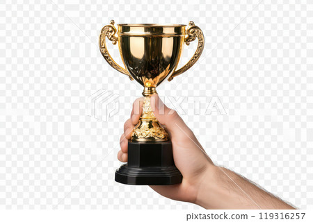 A hand holding a golden trophy cup with ornate handles and a black base, symbolizing victory or success. 119316257