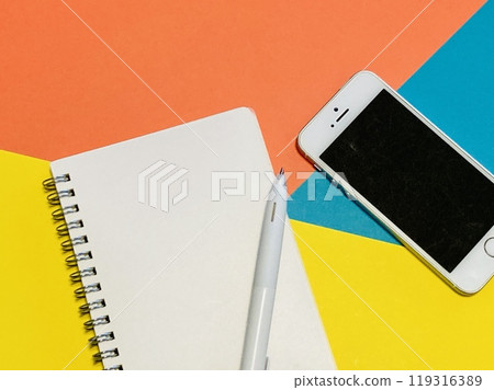 Blank notebook and smartphone (colorful background) 119316389