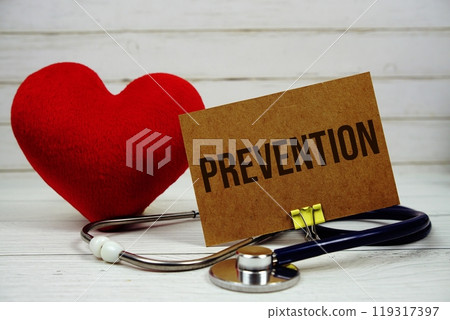 Prevention text message on paper card with stethoscope on wooden background 119317397