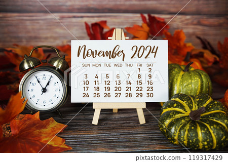 November 2024 monthly calendar with maple leaf on wooden background November 2024 monthly calendar with maple leaf on wooden background 119317429
