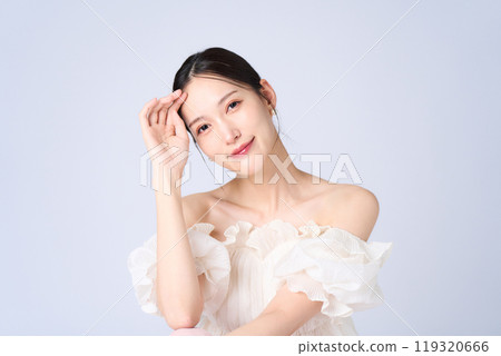 Young woman with a gentle expression Young woman with a gentle expression 119320666