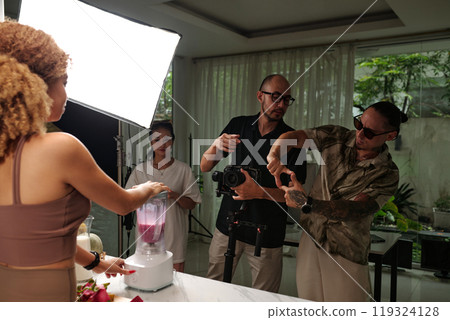 Crew Discussing The Way Of Shooting In Team 119324128