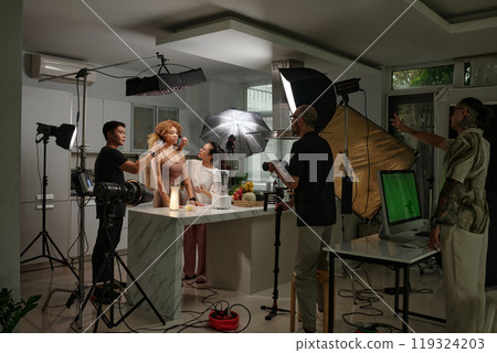 Cameraman Shooting Model In Studio 119324203