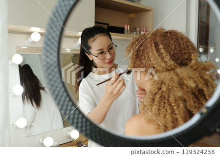 Stylist Preparing Model For Shooting Stylist Preparing Model For Shooting 119324238