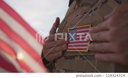 American Soldier With Flag On His Chest Of The United States During Memorial Day American Soldier With Flag On His Chest Of The United States During Memorial Day 119324314