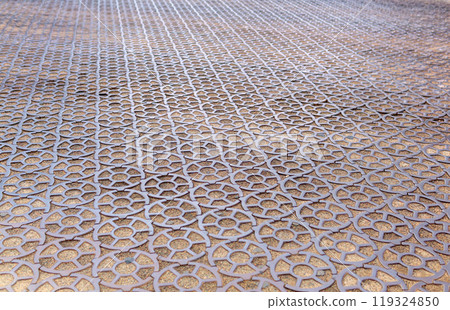 ancient 19th century pavement made of round cast iron blocks ancient 19th century pavement made of round cast iron blocks 119324850