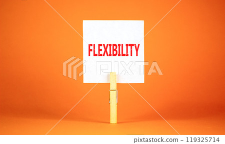 Flexibility symbol. Concept word Flexibility on beautiful white paper on clothespin. Beautiful orange background. Business flexibility concept. Copy space. 119325714
