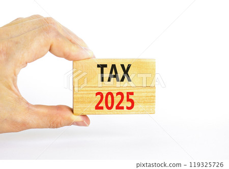 Planning tax 2025 new year symbol. Concept words Tax 2025 on beautiful wooden blocks. Beautiful white background. Businessman hand. Business tax 2025 new year concept. Copy space. 119325726