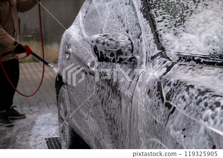 SUV Being Washed at Car Wash 119325905