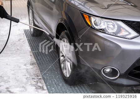 SUV Being Washed at Car Wash 119325916