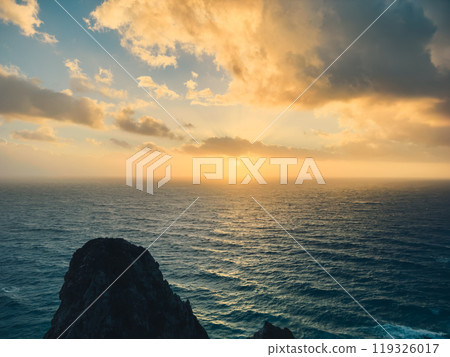 Sunset over the blue ocean Sunset over the blue ocean 119326017