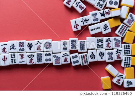 Mahjong tiles on a red background 119326490