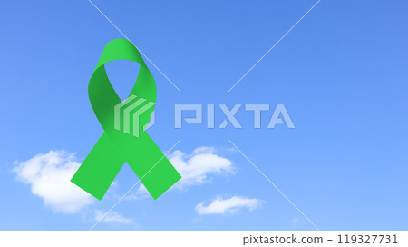 Hand holding green ribbon, symbolizing ovarain cancer awareness. Ribbon represents hope and unity, raising awareness and support for those affected by cancer, fostering understanding and prevention. 119327731