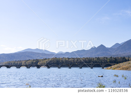 Taushubetsu River Bridge on the former Shihoro Line of the Japanese National Railways on a clear autumn day in Kamishihoro, Hokkaido Taushubetsu River Bridge on the former Shihoro Line of the Japanese National Railways on a clear autumn day in Kamishihoro, Hokkaido 119328536