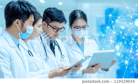 Medical professionals collaborating with technology and data analysis. 119329034