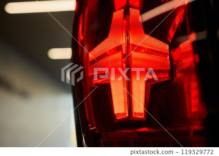 Closeup of a cars automotive tail brake light 119329772