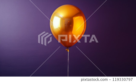 Golden balloon shimmering against a vibrant background during a festive celebration 119330797