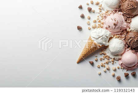 Various scoops of colorful ice cream with chocolate chips, waffle cone, and crumbs on white background. Dessert and indulgence concept with copy space 119332143