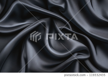 Abstract background with dark blue silk fabric forming smooth waves 119332435