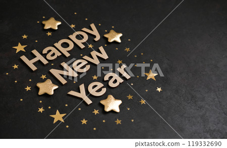 Golden letters Happy New Year with golden stars on a black background. New Year card Golden letters Happy New Year with golden stars on a black background. New Year card 119332690